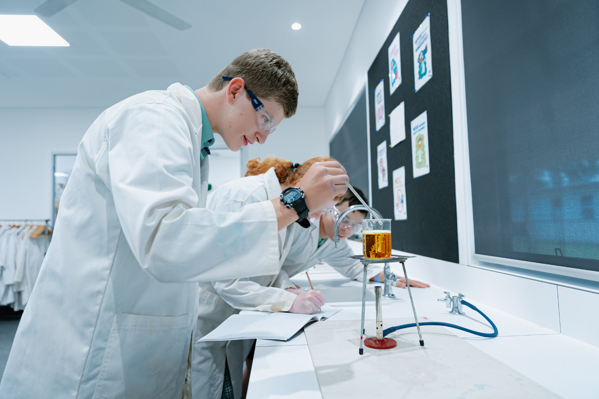 Border Rivers Christian College senior students working through a science experiment in the College laboratory